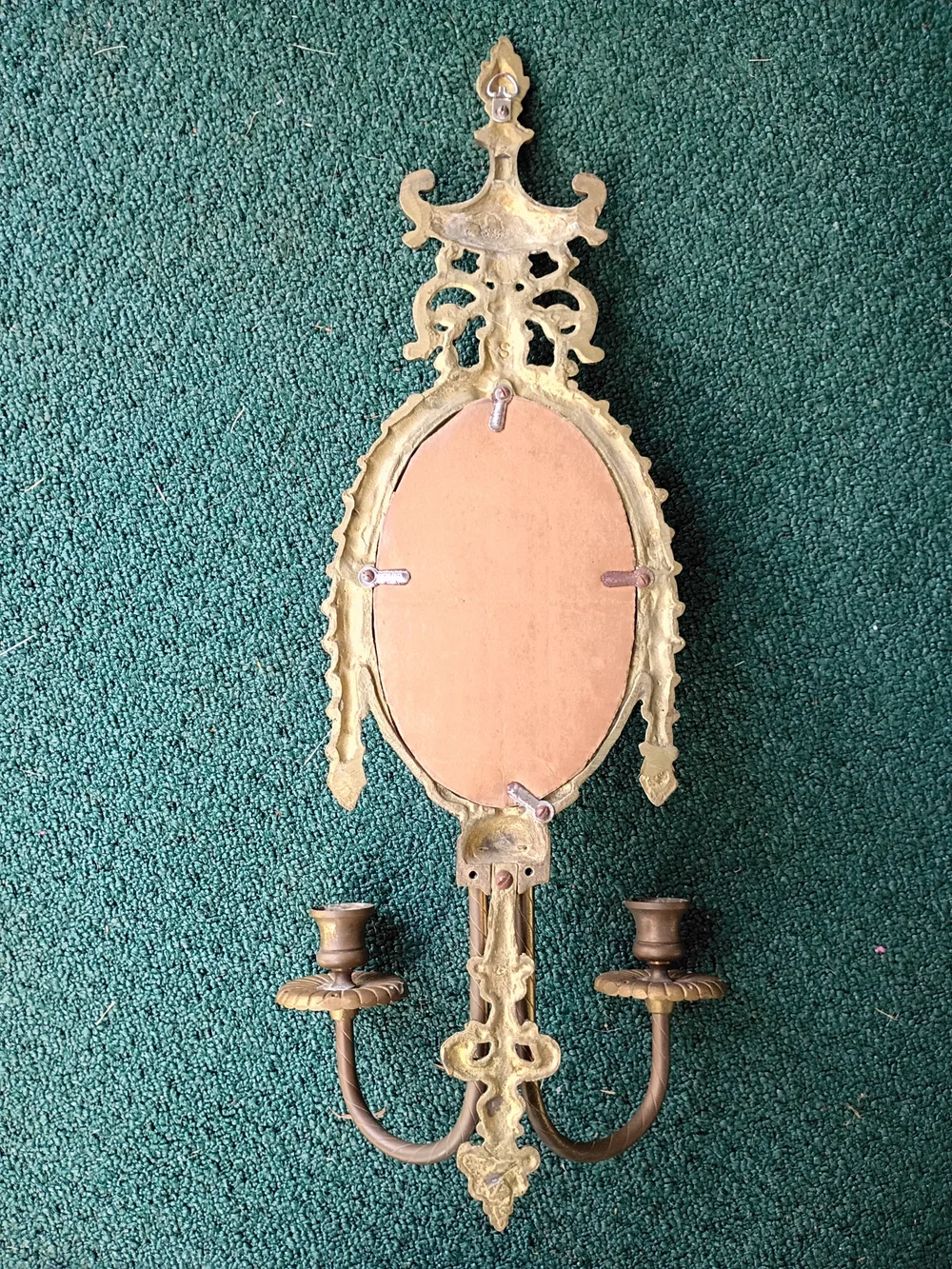 Ornate Gold Oval Wall Mirror with Twin Candle Holders